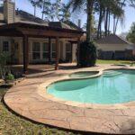 Stamped Concrete and Poolside Pergola